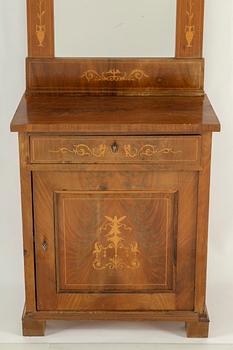 A mirror and cabinet from the mid 1800's.