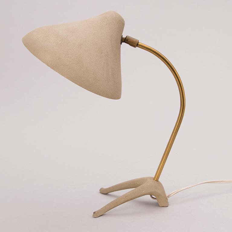 A mid 20th Century model 11-27 table lamp by Idman.