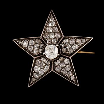 BROSCH, 18k guld och silver med rosenslipade diamanter. Vikt 8 g.