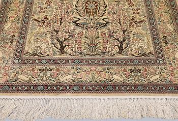 A Oriental silk carpet, 152 x 94 cm.