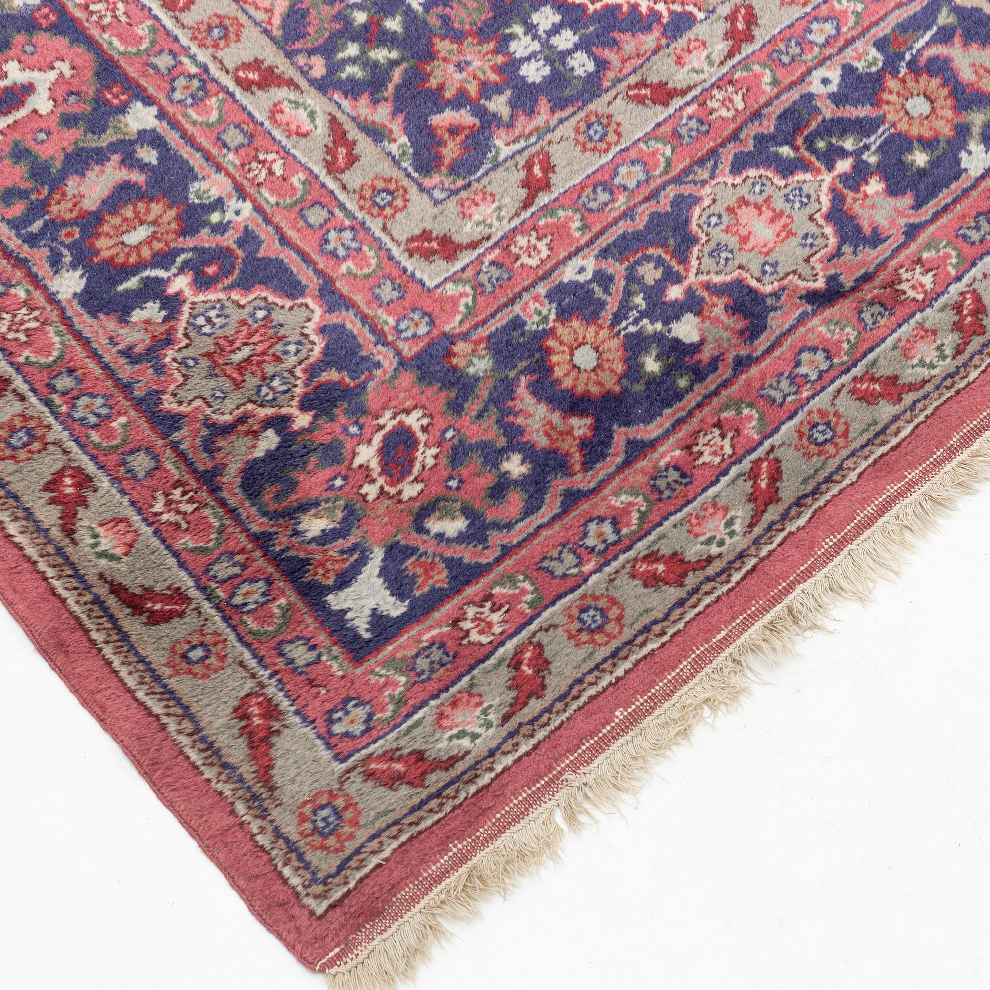 An oriental/eastern European carpet, c. 355 x 275 cm.