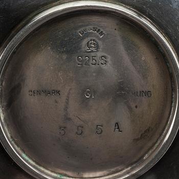 A Danish 20th century sterling set of six ashtrays, mark of G Jensen Copenhagen first half of the 19th century.