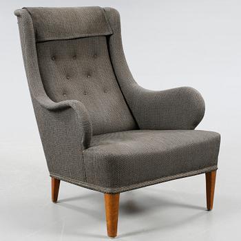 A chair, model Oscar, designed by Carl Malmsten for Carl Malmsten AB, bought 31 of January 1962.