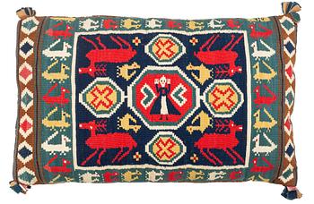 315. A double-interlocked tapestry carrige cushion from the first half of the 19th century, ca 85 x 55 cm, Scania, Sweden.
