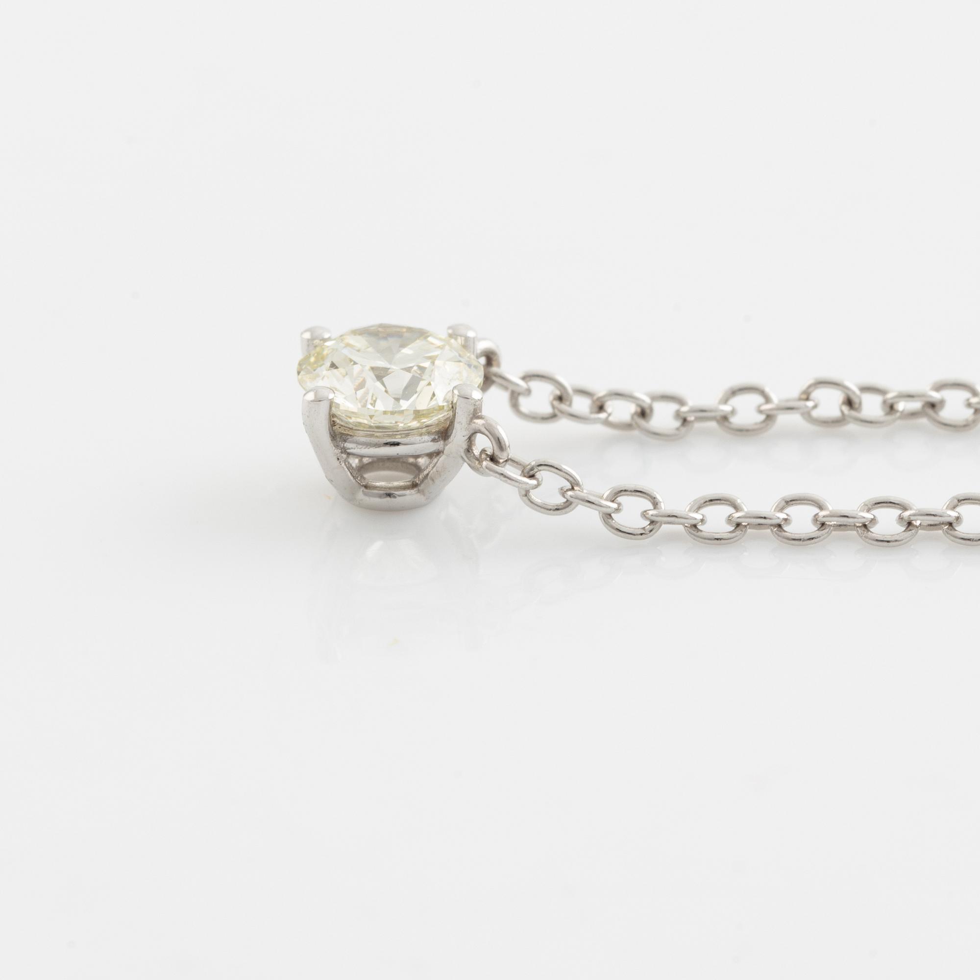 Brilliant cut diamond solitaire necklace.