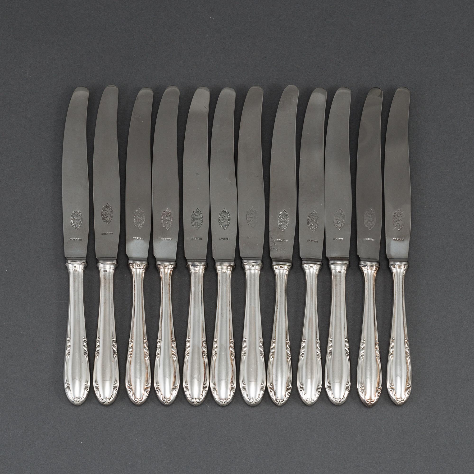 12 silver knives, model "Slottsbarock". Some CG Hallberg, Stockholm 1946.