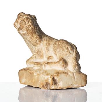 A stone figure of a mythical beast, probably Tang dynasty (618-907).