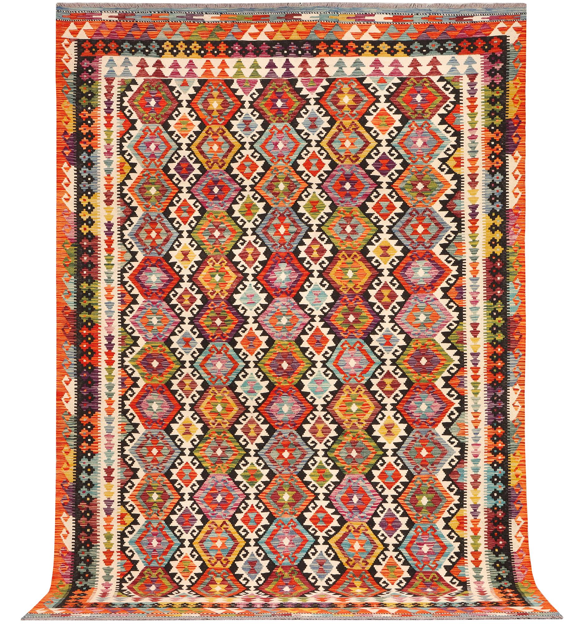 An Afghan Kilim carpet, c. 298 x 202 cm.