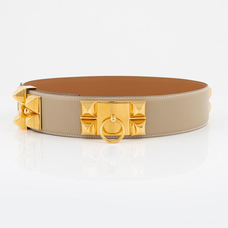 Hermès, a 'Collier de Chien' beige leather belt, 2003. Size 75.