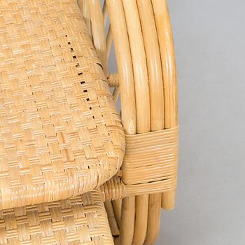 A rattan lounger, late 20th century.