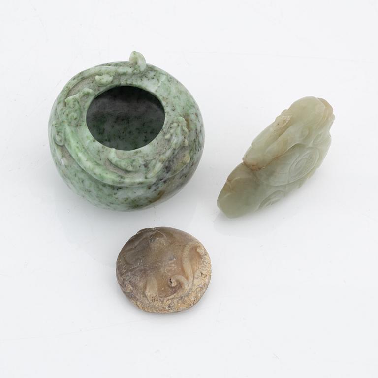 A group of three Chinese nephrite objects and a green stone brush washer, China, 19th/20th Century.