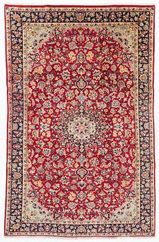 A Tabriz carpet, c. 333 x 216 cm.