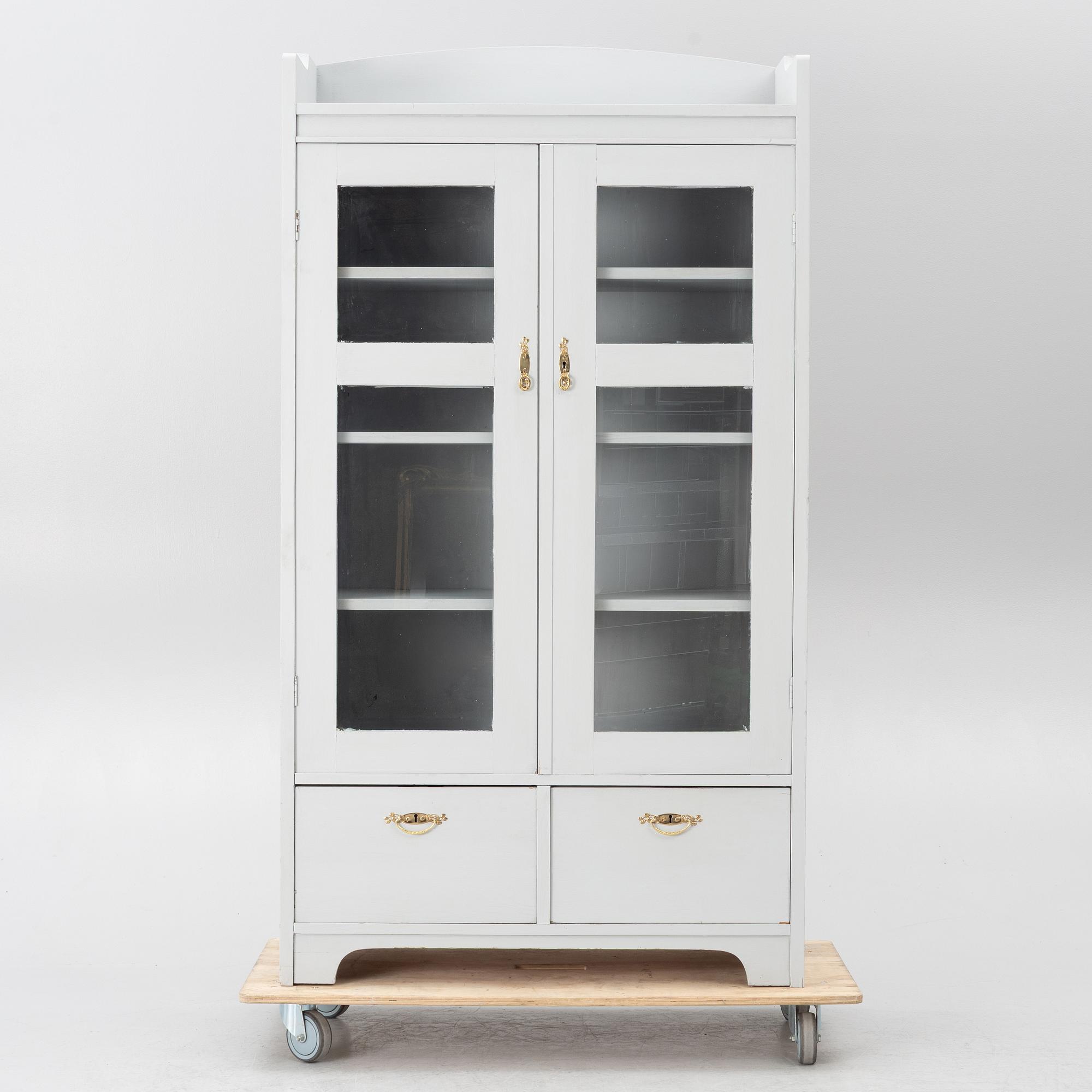 Display cabinet, early 20th century.