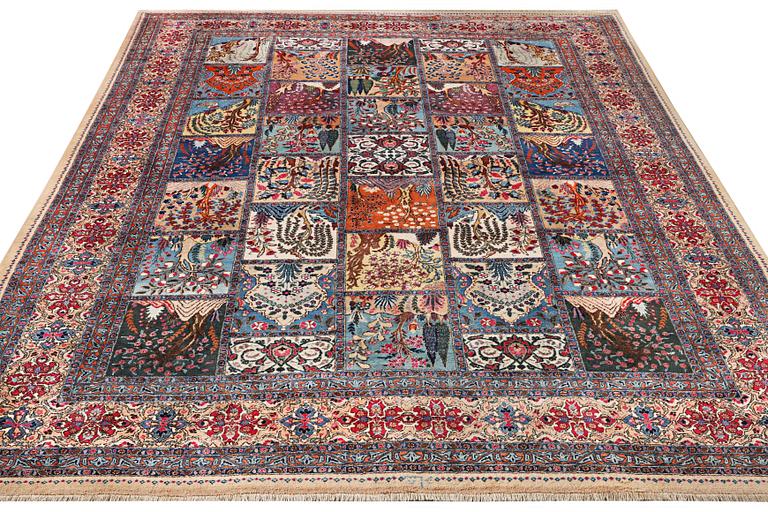 A Kashmar carpet, c. 387 x 297 cm.