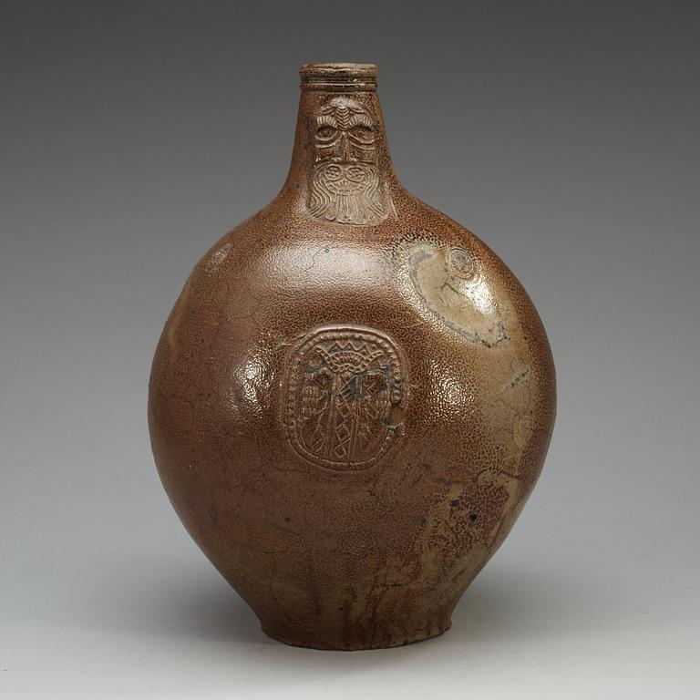 A large salt-glazed stoneware 'Bartman jug', 17th Century.