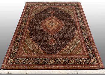 A RUG, Tabriz, part silk, so called 50 Radj, around 220 x 150 cm.