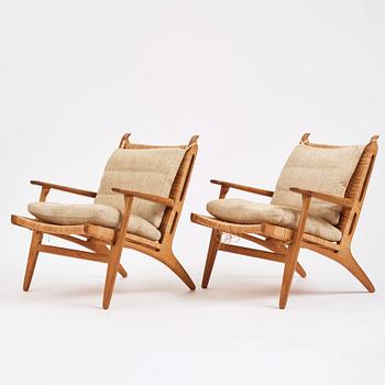 Hans J. Wegner, a pair of oak and rattan 'CH27' chairs, Carl Hansen & Søn, Odense Denmark 1950s-1960s.