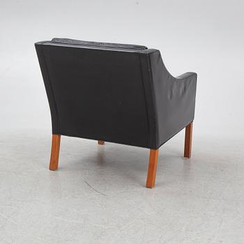 Børge Mogensen, a model 2207 armchair with ottoman, Fredericia Stolefabrik, Denmark, second half of the 20th century.