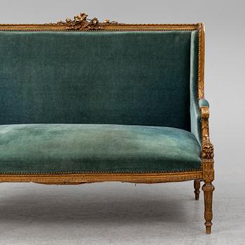 A Louis XVI-style sofa, ca 1900.