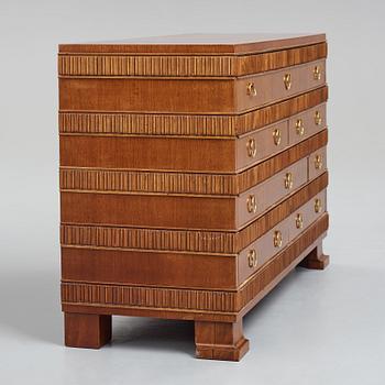 Oscar Nilsson, attributed to, a mahogany chest of drawers, Sweden 1930's.