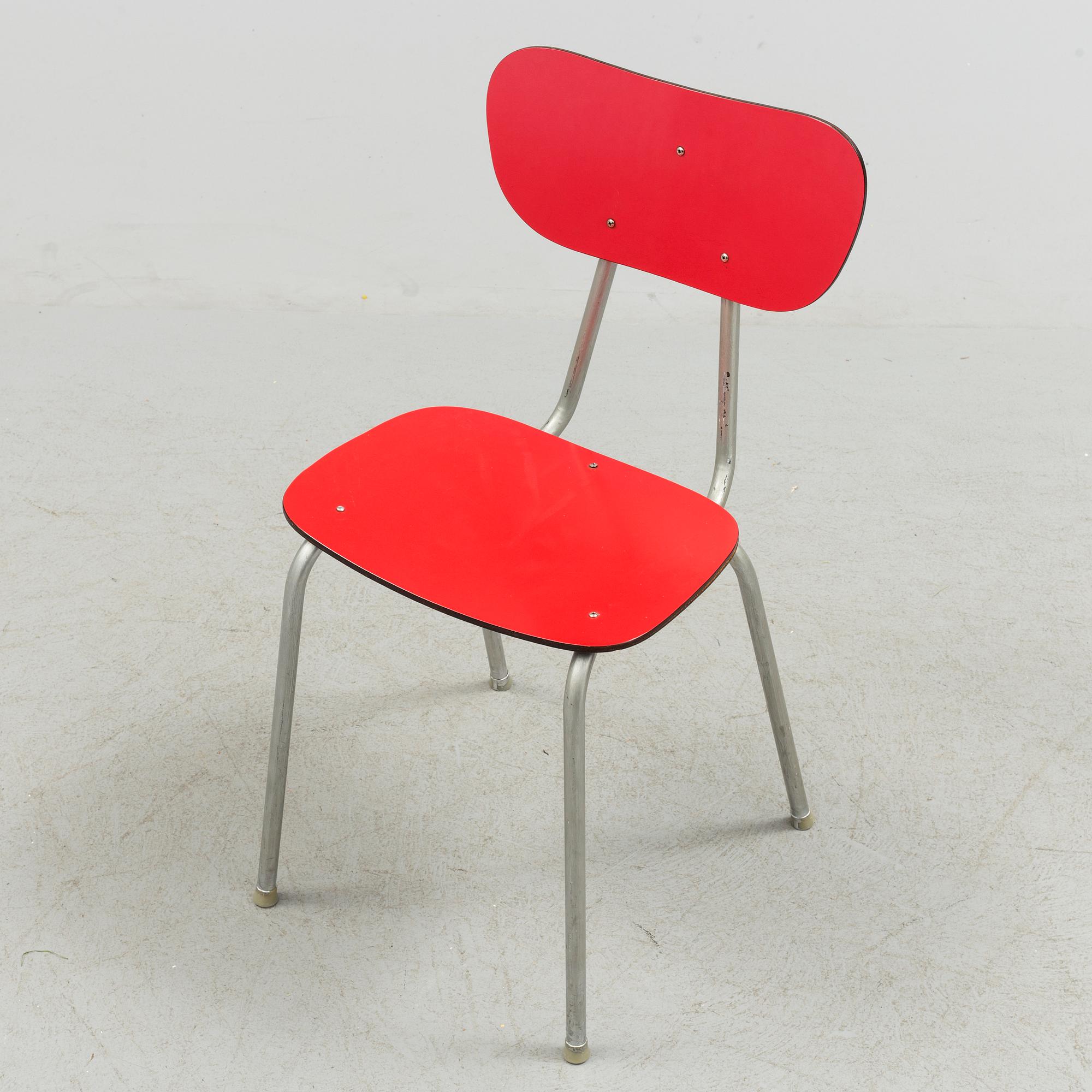 A mid 20th century table and chair.
