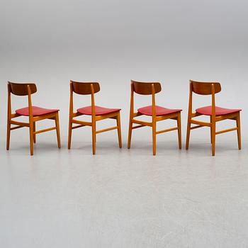 A set of four mid 20th century chairs.