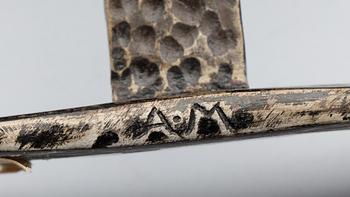 LJUSSTAKE, smidesjärn, märk AM 1936.