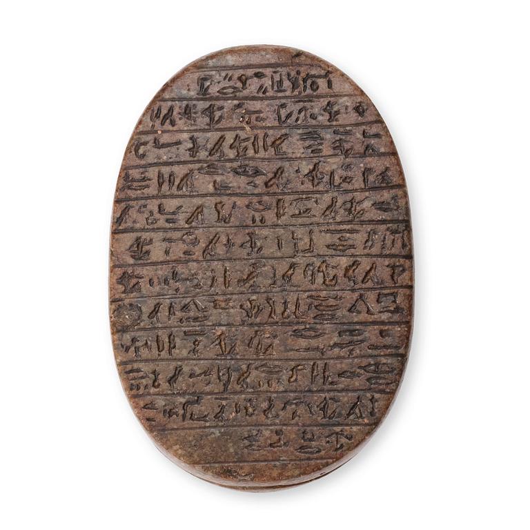 An Egyptian hardstone funerary scarab, probably Late Period, 26th-30th Dynasties, circa 664-343 B.C.