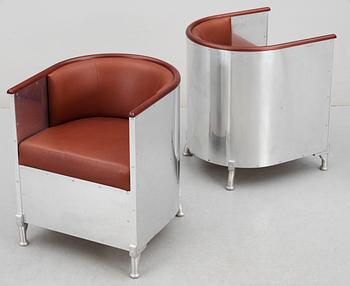A pair of Mats Theselius easy chairs by Källemo, post 1990.