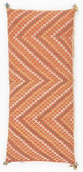 A carrige cushion, flat weave, 120 x 50 cm Scania, mid 19th century.