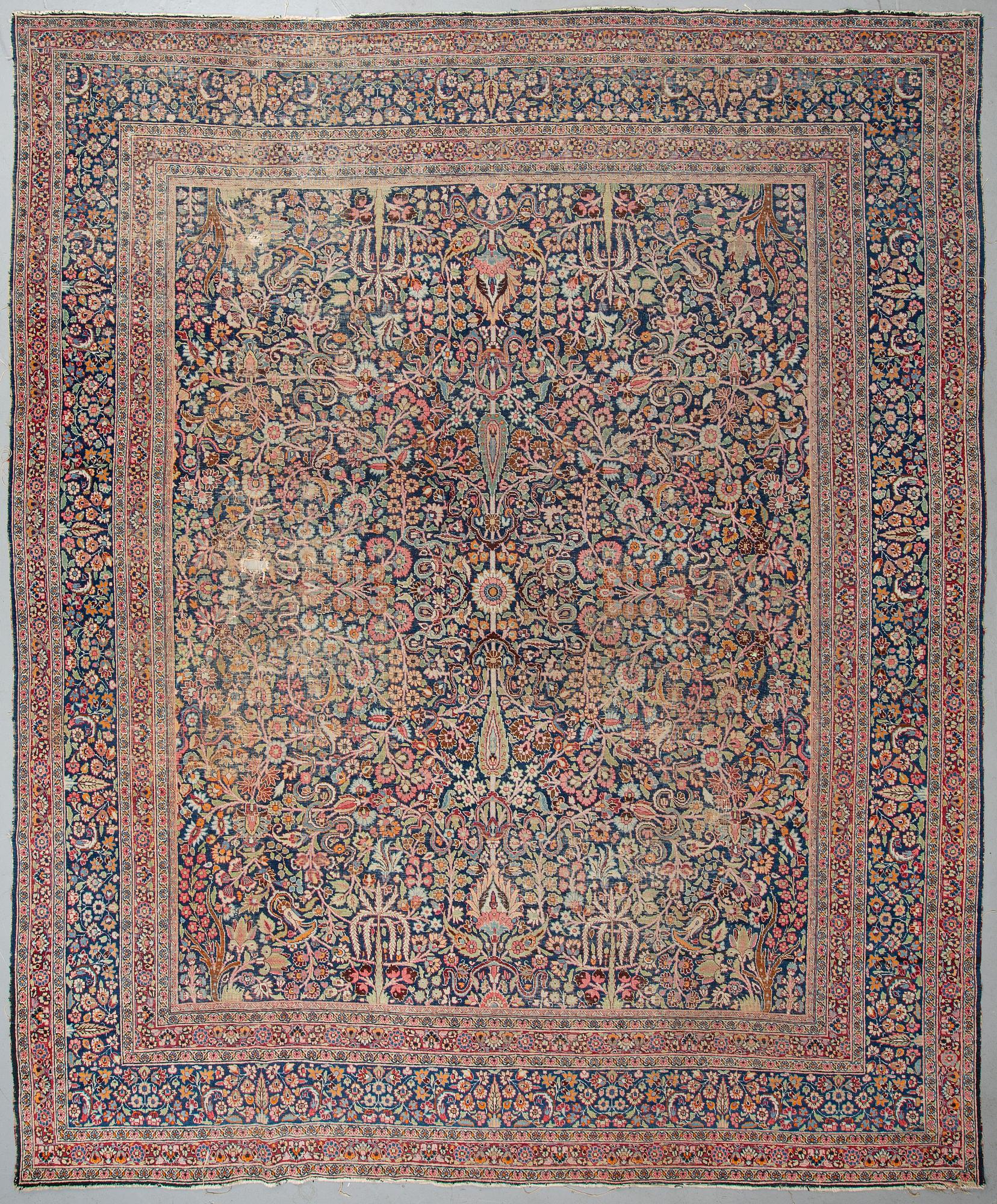 MATTO, an antique/a semi-antique Kerman, ca 384,5-391,5 x 314,5-323 cm.