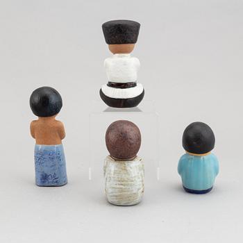 Lisa Larson, eight stoneware figurines from the series "All världens barn" for Gustavsberg.