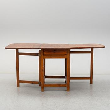 A 19th century gate-leg table.