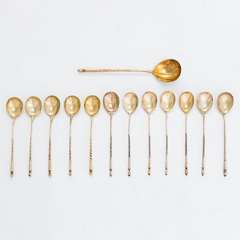 Twelve parcel-gilt teaspoons and a jam spoon, Russia 1887-1926.