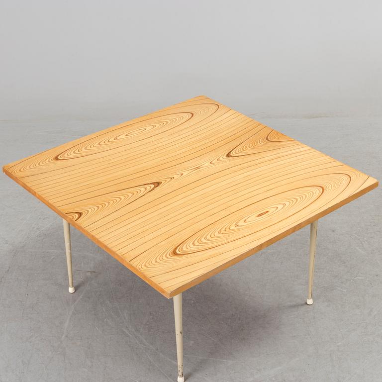 A coffee table marked Tapio Wirkkala, Asko, Made in Finland.