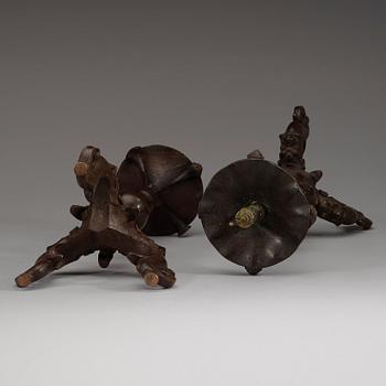 A pair of bronze candlesticks, presumably Ming dynasty (1368-1644).