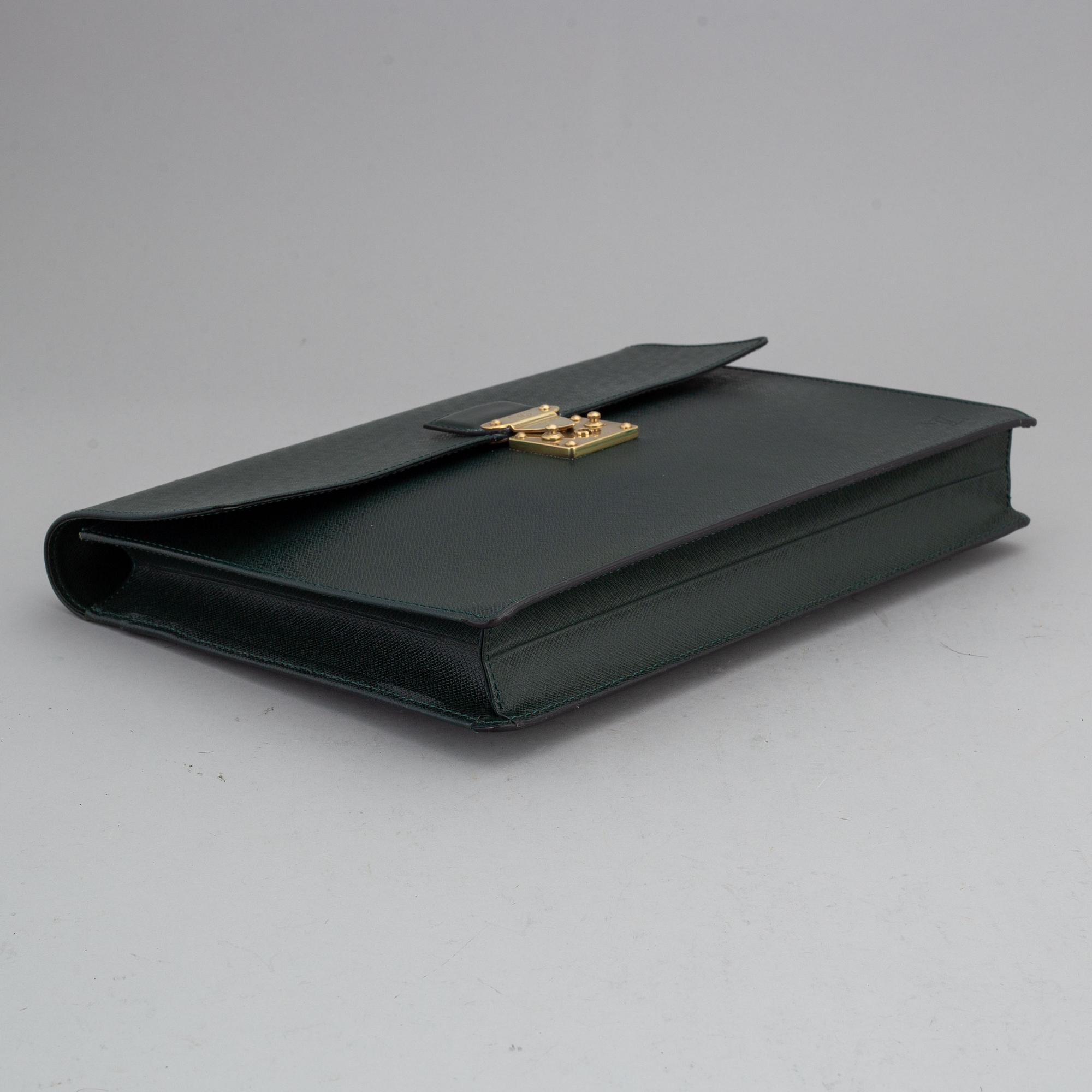 LOUIS VUITTON, a 'Taiga Serviette Kourad' briefcase.