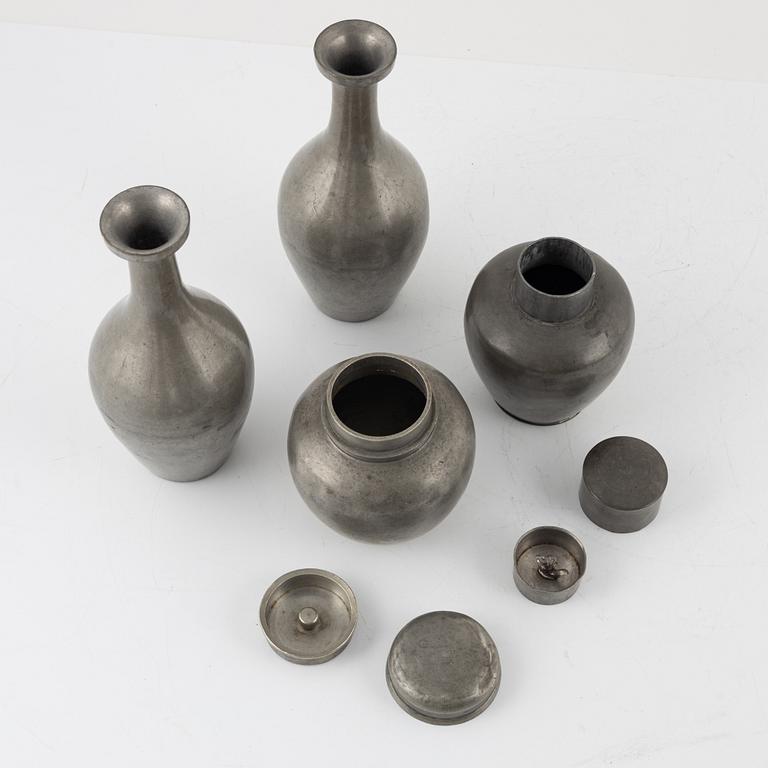 Two Japanese pewter vases and two tea caddies with covers, 20th Century.