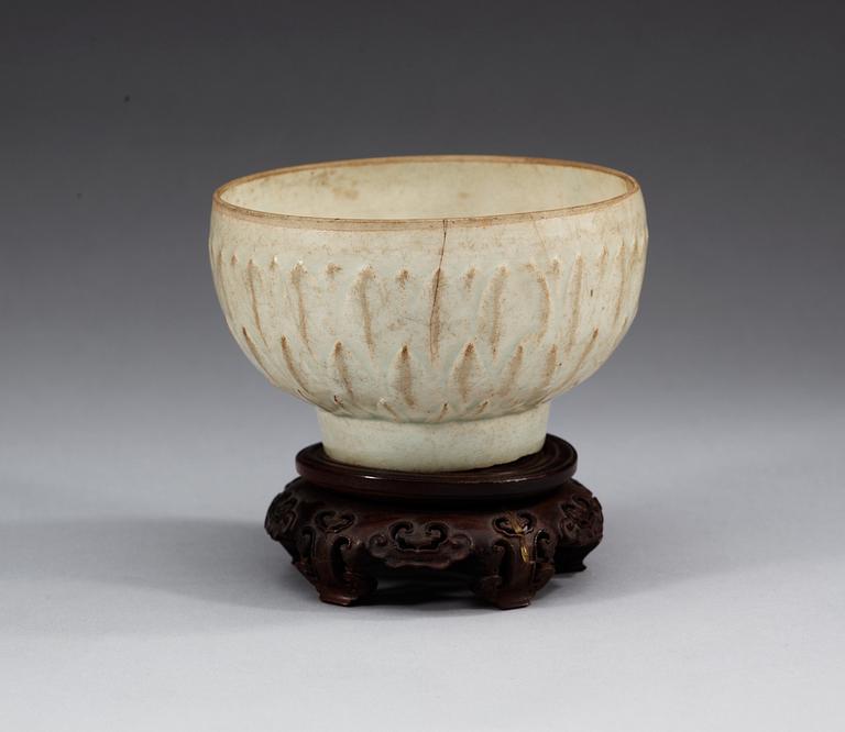 A pale celadon lotus shaped bowl, Song dynasty.