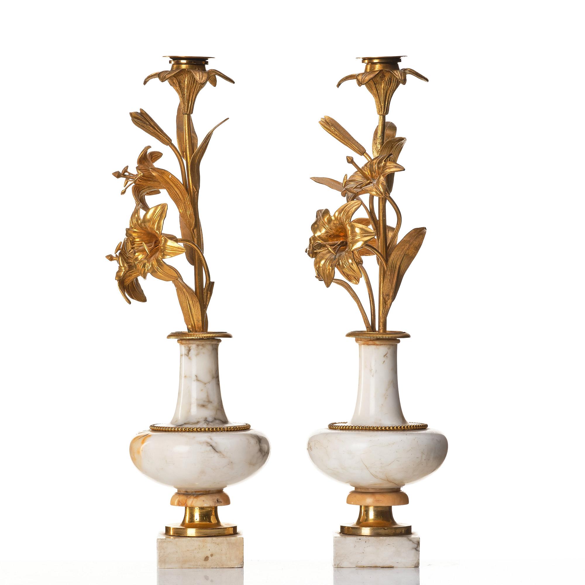 A pair of Louise Philippe candlesticks.