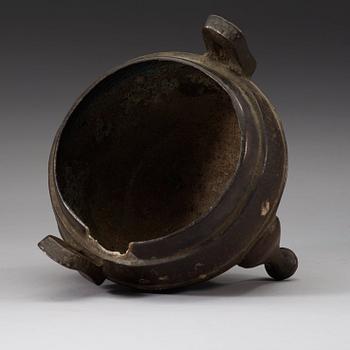 A bronze tripod censer, presumably Han dynasty (206 B.C-220 A.D).