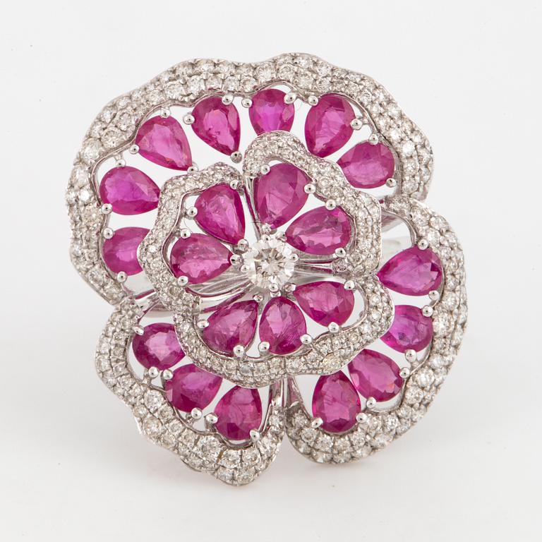 Ruby and brilliant-cut diamond flower ring.
