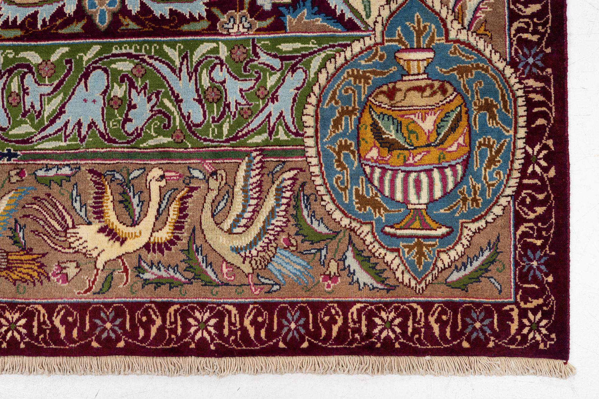 A Kashmar carpet, c. 347 x 242 cm.