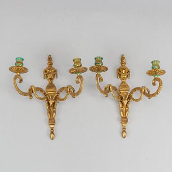 A pair of wall sconces, Louis XVI style, early 20th century.