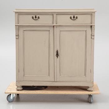 A cupboard, circa 1900.