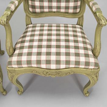 A pair of 20th century  Rococo style armchairs.