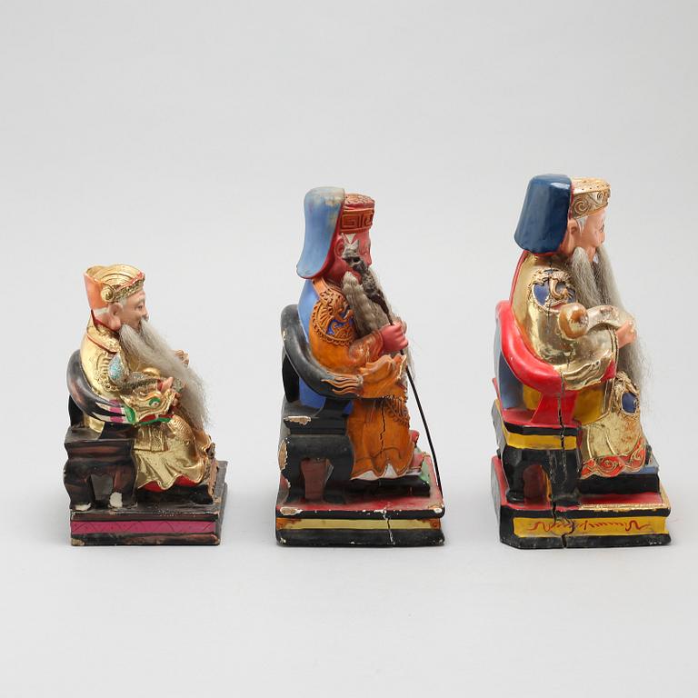 A set of three wooden deities, China, early 20th Century.