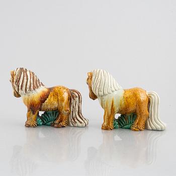 Gunnar Nylund, a pair of stoneware figurines, Rörstrand, Sweden, mid 20th century.