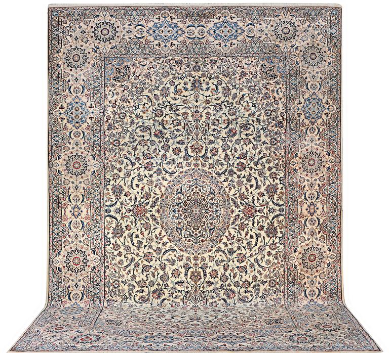 A Nain carpet, part silk, 9 laa, c. 453 x 298 cm.