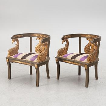 A pair of chairs and a side table, second half of the 20th century. Empire style.